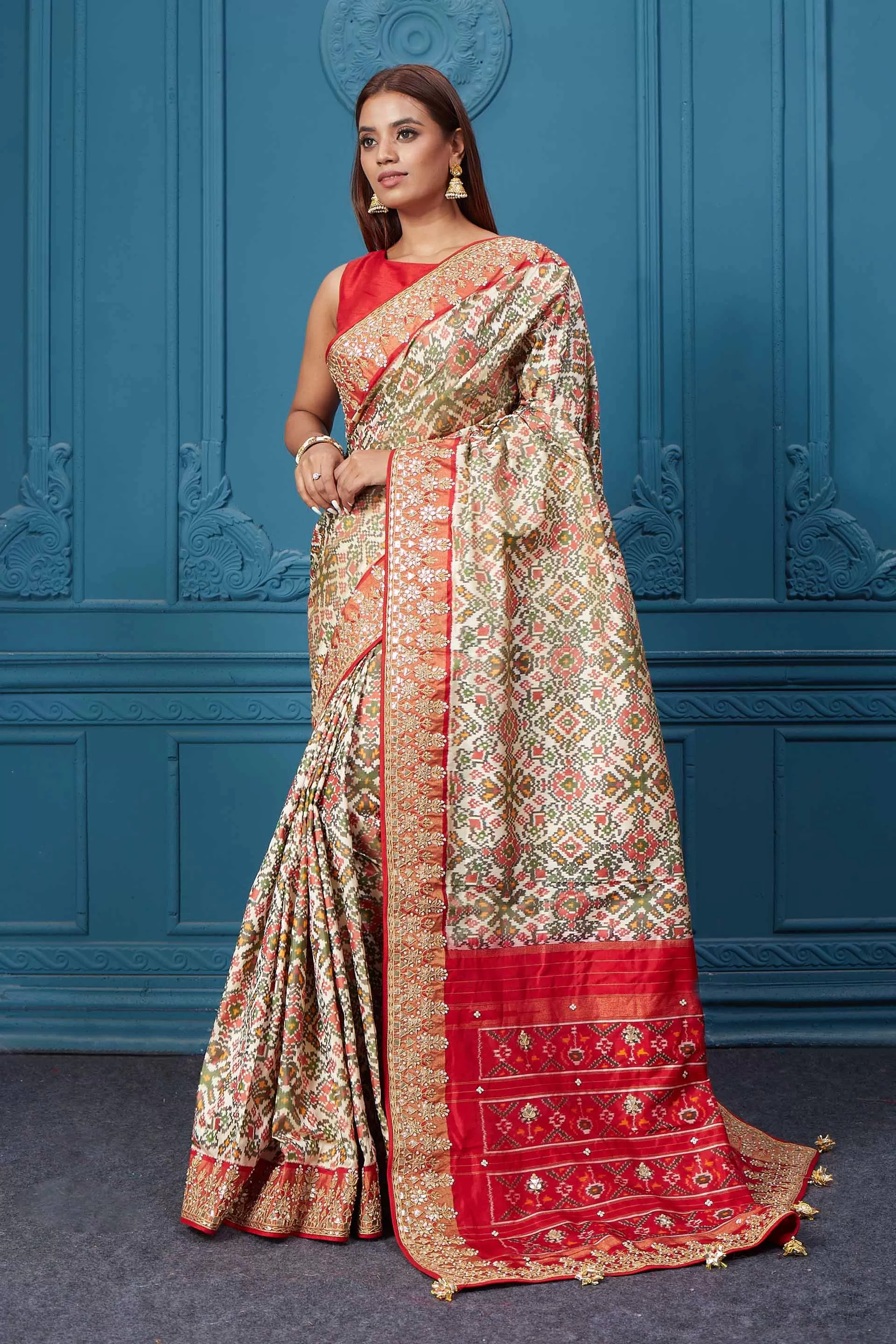 91A038 Off White Patola Silk Saree with Red Embroidered Border