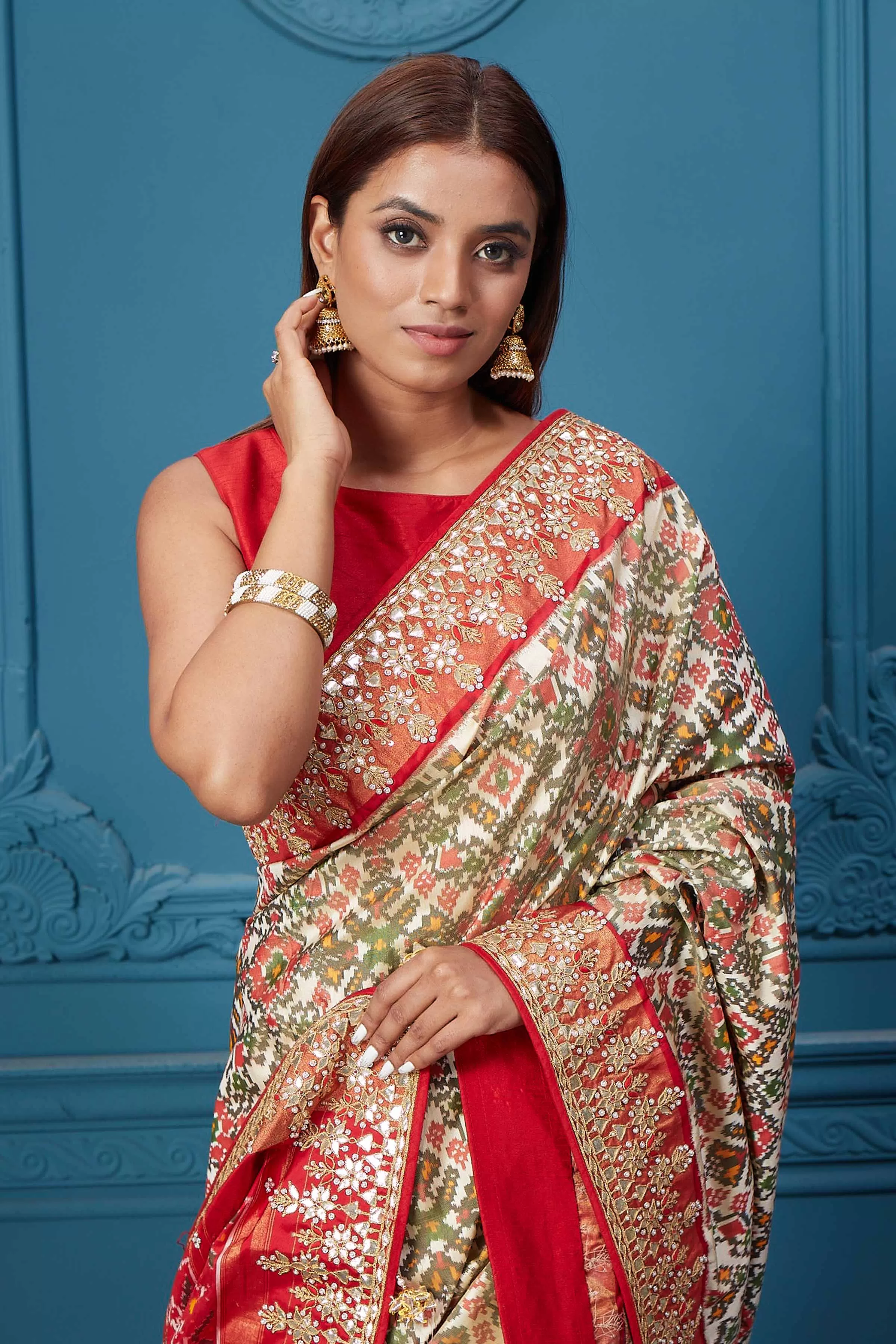 91A038 Off White Patola Silk Saree with Red Embroidered Border