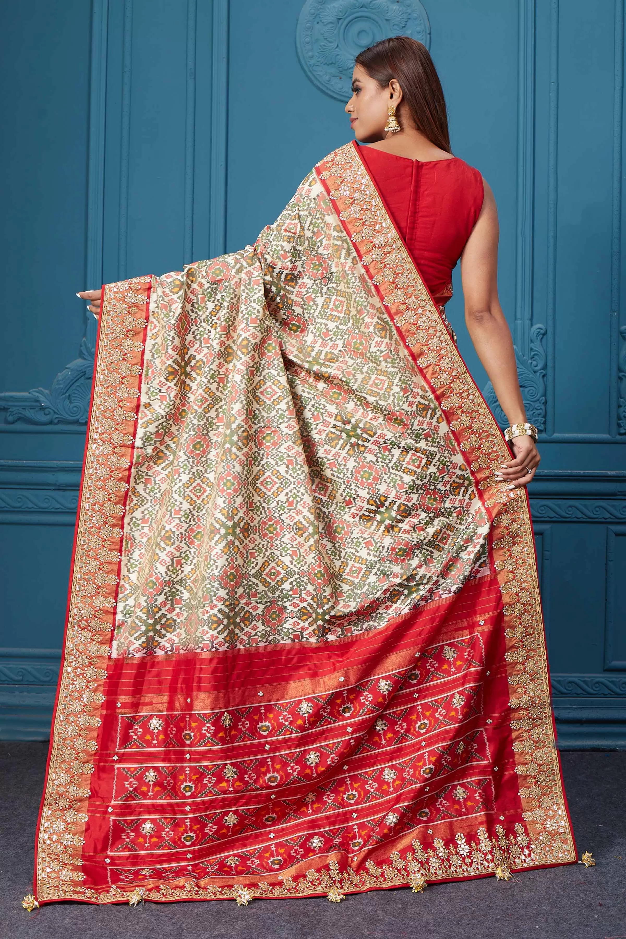 91A038 Off White Patola Silk Saree with Red Embroidered Border