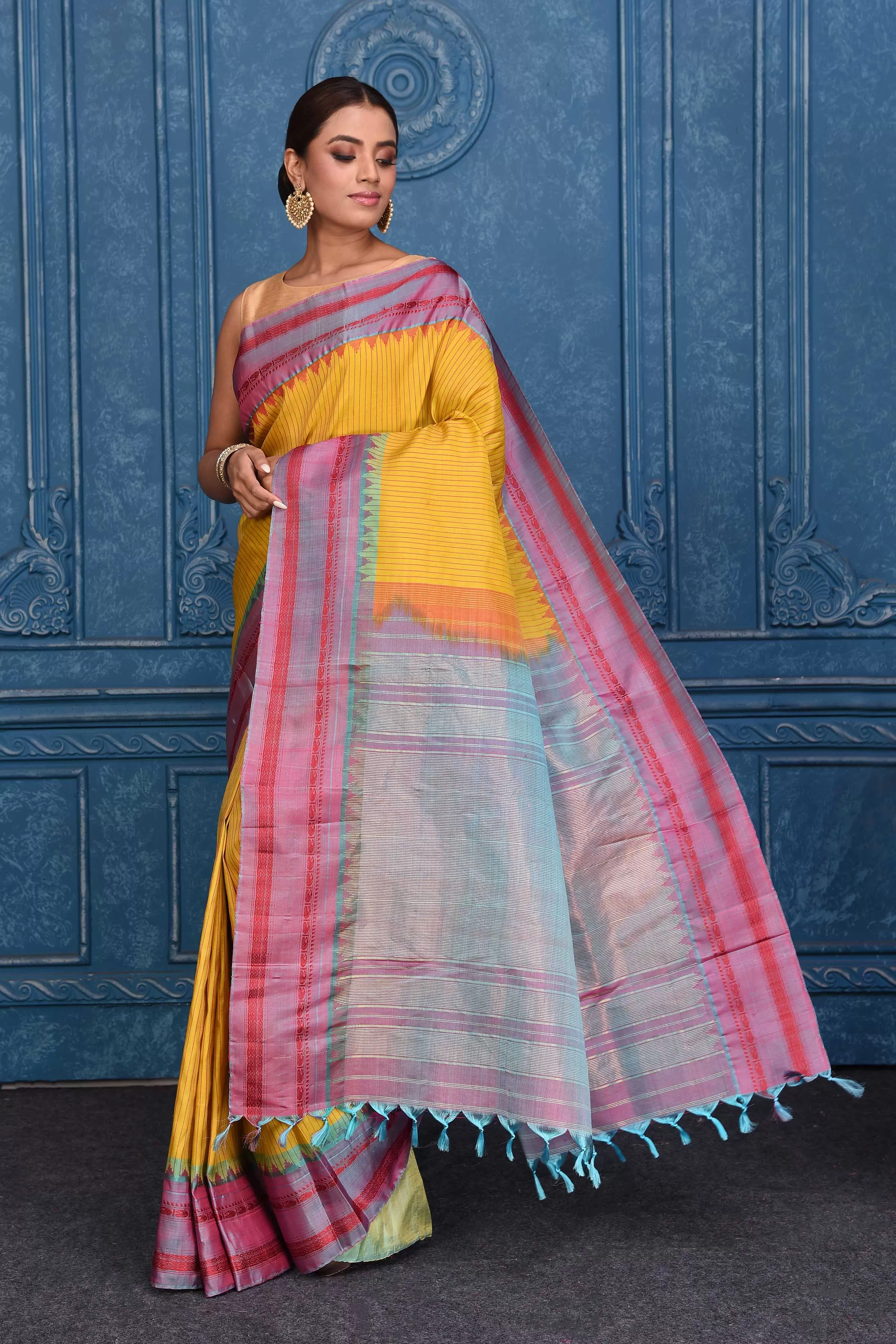 91A135 Yellow Striped Pure Gadhwal Silk Sari with Bluish Pink Border