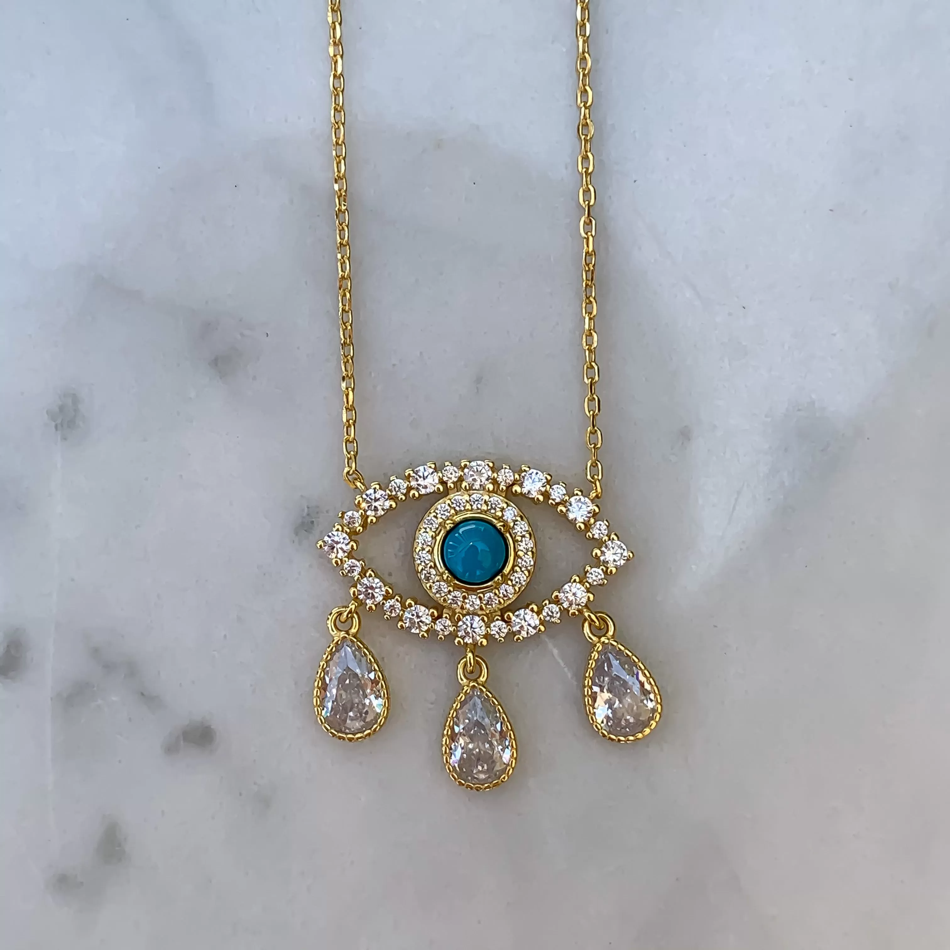 Gold plated turquoise “Diamond Tears eye necklace