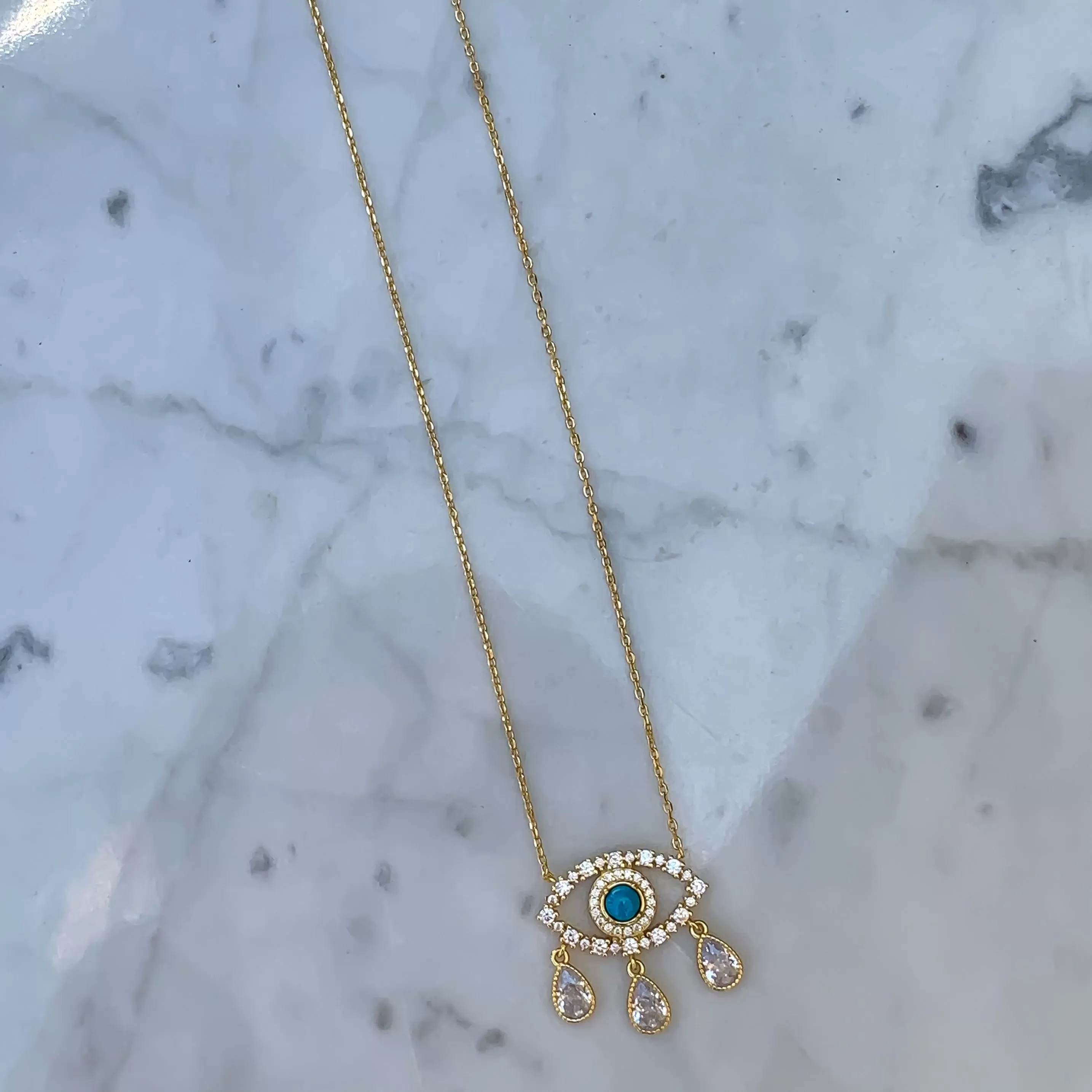 Gold plated turquoise “Diamond Tears eye necklace