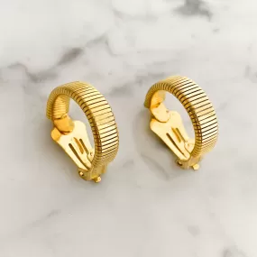 KRYSTAL gold tone omega hoop clip earrings