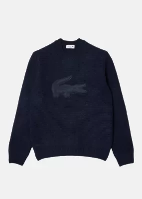 Pull en laine avec badge crocodile matelassé