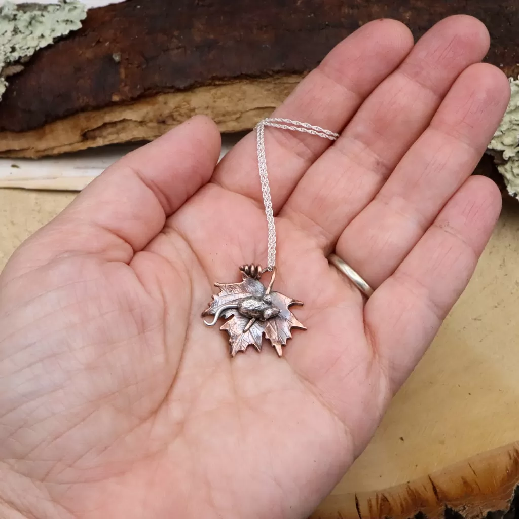 Tiny Mouse on her Maple Leaf Necklace