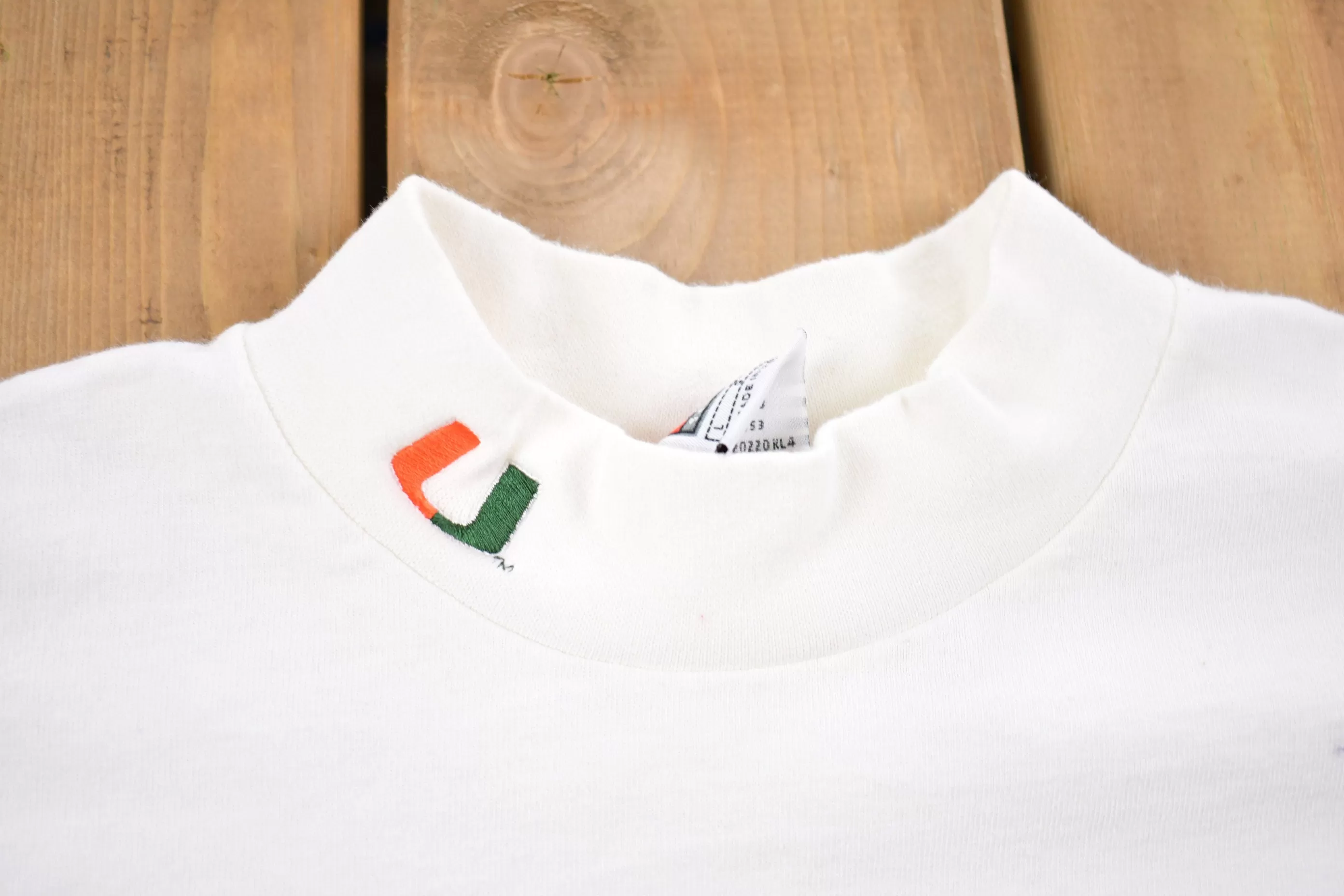 Vintage 1990s Nike University of Miami Hurricanes Collegiate Mockneck / Embroidered / NCAA / Sportswear / Americana / Nike Mockneck